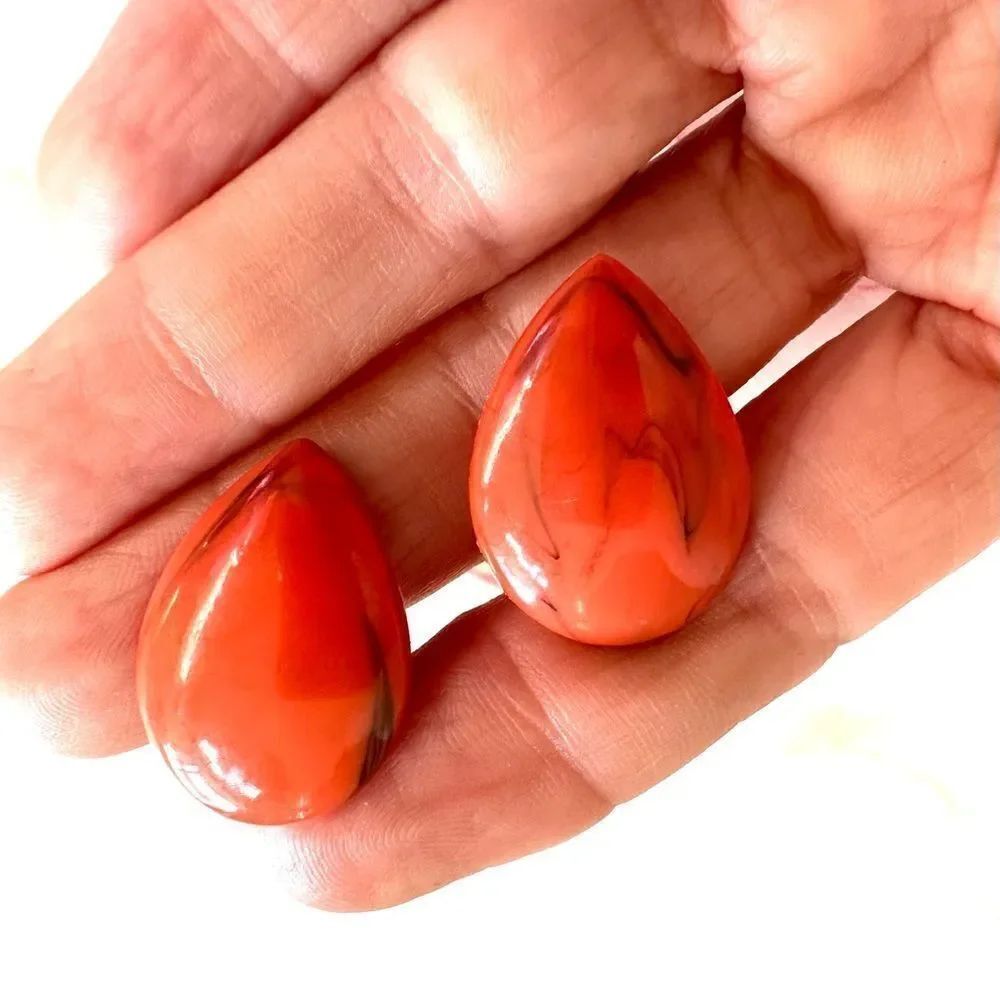 Orange teardrop clip on earrings